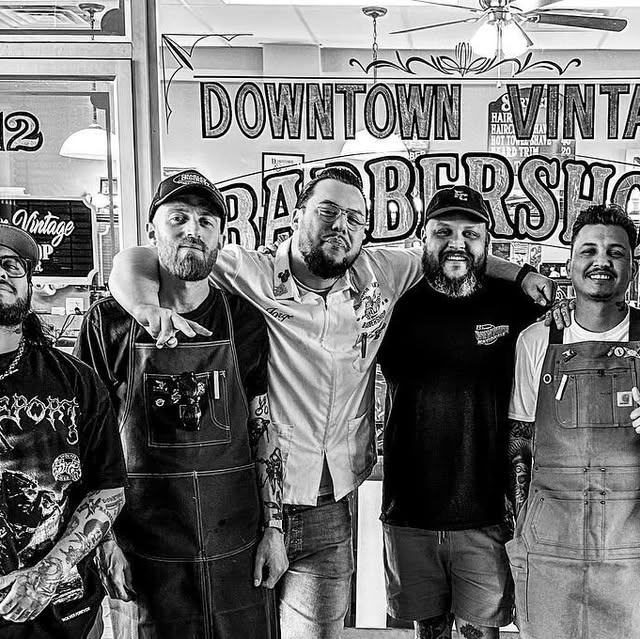The Downtown Vintage Barbershop crew in front of the Fremont Street shop