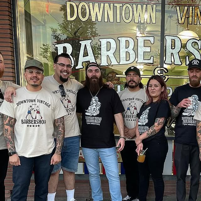 Downtown Vintage Barbershop team celebrating their anniversary